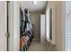 A walk-in closet with shelving and storage, offering plenty of room for clothing at 105 Pinecrest Dr, Angier, NC 27501