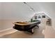 Bright game room featuring a large poker table with lighting and decor at 105 Pinecrest Dr, Angier, NC 27501