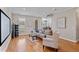Inviting living room with hardwood floors, comfortable seating, and large screen at 105 Pinecrest Dr, Angier, NC 27501