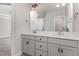 Bathroom featuring double vanity with white countertops and sleek fixtures at 110 Lilac Dr, Franklinton, NC 27525