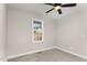 Cozy bedroom featuring plush carpet, a window for natural light, and neutral wall color at 110 Lilac Dr, Franklinton, NC 27525