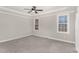 Comfortable main bedroom offering large windows providing natural light and outside views at 110 Lilac Dr, Franklinton, NC 27525