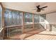 Beautiful screened-in porch with wood flooring and ceiling fan; an ideal outdoor living space at 110 Lilac Dr, Franklinton, NC 27525