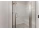 Shower featuring white subway tile, a bench, and a seamless glass door at 110 Lilac Dr, Franklinton, NC 27525
