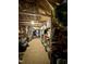 Ample attic storage space with exposed wooden beams and lighting at 1113 Hudson Dr, Mebane, NC 27302