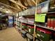 Organized attic with shelving and multiple storage containers at 1113 Hudson Dr, Mebane, NC 27302
