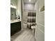 Clean bathroom features a vanity, toilet, and shower, perfect for everyday comfort and convenience at 1113 Hudson Dr, Mebane, NC 27302
