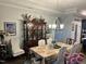 Charming dining room with traditional furniture, chandelier, and a cozy atmosphere perfect for gatherings at 1113 Hudson Dr, Mebane, NC 27302