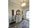 Inviting entryway features a decorative rug and a stylish console table at 1113 Hudson Dr, Mebane, NC 27302