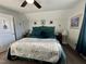 Comfortable main bedroom showcasing a plush, tufted headboard at 1113 Hudson Dr, Mebane, NC 27302
