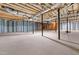 Large unfinished basement with support beams and exposed ceiling at 1175 Faulkner Town Rd, Henderson, NC 27537