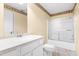 Bathroom with a single sink vanity, a toilet, and a shower with glass doors at 1175 Faulkner Town Rd, Henderson, NC 27537