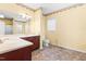 Bathroom featuring a sink with countertop space, a toilet, and a window with blinds at 1175 Faulkner Town Rd, Henderson, NC 27537