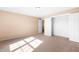 Bedroom with neutral walls, carpet, ceiling light, closet and open door at 1175 Faulkner Town Rd, Henderson, NC 27537