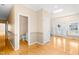 Entryway featuring hardwood floors, natural light, and a view of the staircase at 1175 Faulkner Town Rd, Henderson, NC 27537