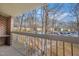 This balcony provides a lovely view of the community's well-maintained landscaping and parking area at 1287 Schaub Dr # J, Raleigh, NC 27606