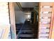 A gutted home with exposed floorboards, insulation, and a window at 1404 Gearwood Ave, Durham, NC 27701