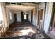 Spacious Living Room needing some TLC, natural light from window, open beams and exposed floor enhance potential at 1404 Gearwood Ave, Durham, NC 27701