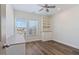 Bedroom with a built-in cabinet and two windows at 1516 Ferntree Ct, Morrisville, NC 27560