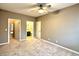 Bedroom with neutral walls, plush carpeting, and open doorway to bathroom at 1522 Kudrow Ln, Morrisville, NC 27560