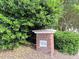 Photo of the Preston Creekside neighborhood entrance sign surrounded by lush greenery at 1522 Kudrow Ln, Morrisville, NC 27560