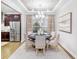Formal dining room with stylish lighting, elegant table setting, and sophisticated design at 1800 Red Roses Ave, Durham, NC 27703