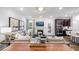 Spacious living room with hardwood floors, elegant furniture, and plenty of natural light at 1800 Red Roses Ave, Durham, NC 27703