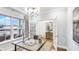 Bright home office with double French doors, a view of the outdoors, and stylish furnishings at 1800 Red Roses Ave, Durham, NC 27703