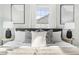 Cozy bedroom with stylish decor, decorative pillows, lamps, and natural light from the window at 2204 Guess Rd, Durham, NC 27705