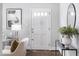 Entryway featuring a stylish front door, hardwood floors, and decor at 2204 Guess Rd, Durham, NC 27705