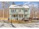 Home's backyard with deck and winter setting offers a serene outdoor space at 2209 Woodnell Dr, Raleigh, NC 27603
