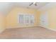 Bedroom with carpet, a ceiling fan and natural light at 2209 Woodnell Dr, Raleigh, NC 27603
