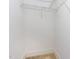 A walk-in closet with wire shelving, ready for easy storage at 2209 Woodnell Dr, Raleigh, NC 27603