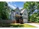 Well-maintained home featuring a welcoming front porch and attached garage at 2209 Woodnell Dr, Raleigh, NC 27603