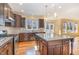 Kitchen with granite counters, stainless appliances and an eat-in nook with natural light at 2209 Woodnell Dr, Raleigh, NC 27603