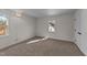 Bedroom features neutral carpet, with a window and a closet at 2908 Basswood Dr, Raleigh, NC 27610