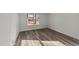 Light and airy bedroom featuring new flooring and natural light at 2908 Basswood Dr, Raleigh, NC 27610