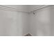 A white closet with shelves and clothing rod provides ample storage at 2908 Basswood Dr, Raleigh, NC 27610