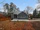 Charming home featuring neutral siding, a well-maintained lawn, and a welcoming concrete entryway at 3300 Mossdale Ave, Durham, NC 27707