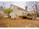 Backyard featuring a deck and lush greenery for outdoor living at 3320 Derbyshire Pl, Raleigh, NC 27604