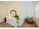 Bedroom showcasing dresser with mirror and an alcove with cozy seating at 3320 Derbyshire Pl, Raleigh, NC 27604