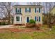 Charming two-story home with a well-manicured front yard and inviting curb appeal at 3320 Derbyshire Pl, Raleigh, NC 27604