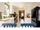 Modern kitchen with white cabinets, butcher block countertops, and stainless steel appliances at 3320 Derbyshire Pl, Raleigh, NC 27604