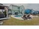 Spacious backyard with a pool, gazebo, and lounge chairs at 416 Granite Saddle Dr, Rolesville, NC 27571