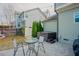 Backyard featuring a hot tub and a table with chairs at 416 Granite Saddle Dr, Rolesville, NC 27571