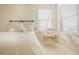 Bedroom featuring carpet flooring, windows with blinds, and swinging hammock chair at 416 Granite Saddle Dr, Rolesville, NC 27571