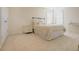 Bedroom with carpet flooring, windows with blinds, and neutral colored bedding at 416 Granite Saddle Dr, Rolesville, NC 27571