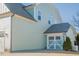A close-up of the home's attached garage, which features a carriage door and matches the home's exterior at 416 Granite Saddle Dr, Rolesville, NC 27571