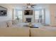 Bright living room with a fireplace, TV, and comfortable seating area at 416 Granite Saddle Dr, Rolesville, NC 27571