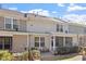 Exterior view of a townhouse with a fenced backyard, patio, and a screened porch at 468 Talons Rest Way, Cary, NC 27513